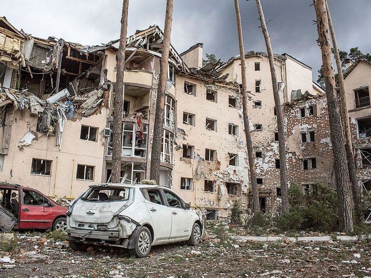 An_apartment_building_damaged_following_a_shelling_on_the_town_of_Irpin__26_kilometers_west_of_Kyiv_.jpg